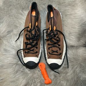 Brown Converse high top sneakers